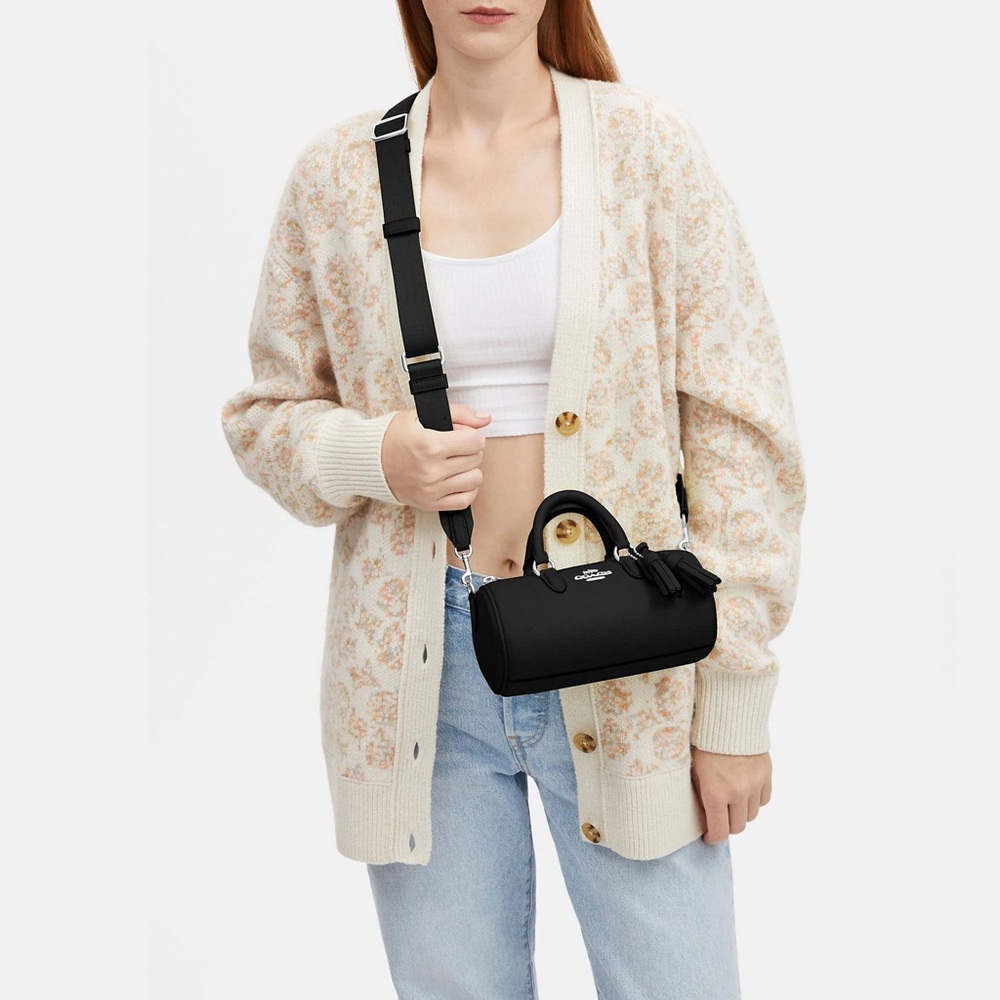 Coach Lacey Mini Black Leather Barrel Crossbody Bag with Silver Accents.